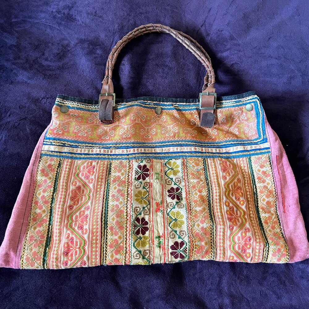 Cloth Bag with Embroidered details with leather straps and snap closure